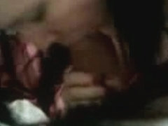 Dark-haired girl sucking cock