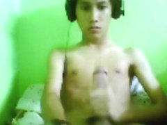 Beautiful Young Asian Boy Masturbates Music