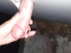 Gf jerking a hot cock at the glory hole