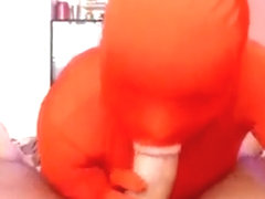 Sexy curvy australian in an orange jumpsuit