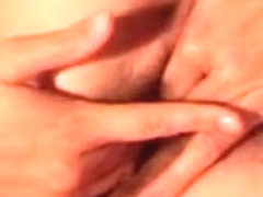 Horny amateur wife plays with her cock hungry snatch in bed