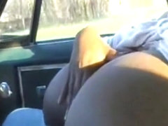 Fat ebony girl with huge boobs bounces them around and sucks her bf's cock in public in his car