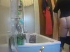 My aunty gets caught on camera washing and shaving her vagina
