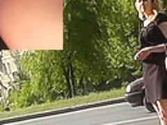 Woman in tight skirt waits for bus in upskirt video