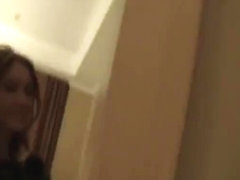 Teen girl having fun dancing naked in a hotel room
