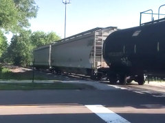 a C40-8 leads a short manifest thru Robins, IA