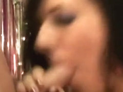 Slim brunette Ashli Orion works her lips and hands on a raging shaft