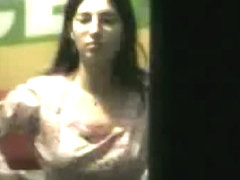 Gorgeous brunette window voyeur video