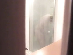 Girl shaves her pussy in the shower