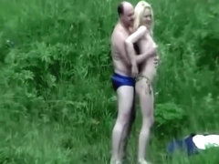 Older guy fucks a teen girl by the river