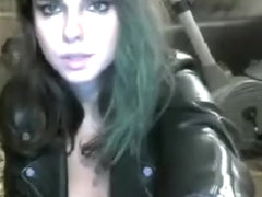 sexy brunette in black leather chats and shows her boobs and pussy