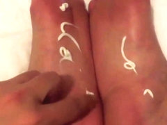 Rubbing lotion into my sexy feet