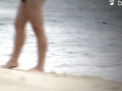 Hidden beach camera video of attractive nudist men and women