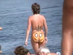 Nudist woman smile on her butt