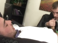 Gay blowjob at the office