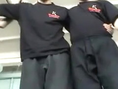 Three martial artists trampling at dojo